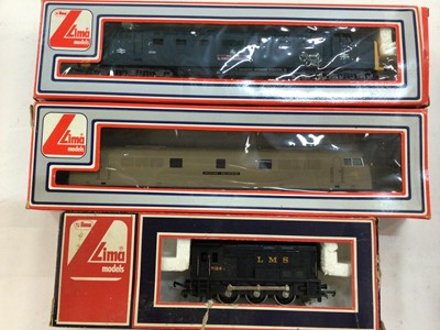 Lot 1909 - Railway Lima OO gauge selection including three boxed locomotives and other carriages and wagons, plus some unboxed track and rolling stock. Also some 1970's plastic models including military. Two...