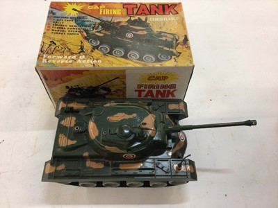 Lot 1924 - Marx cap firing tank boxed, Lincoln International heavy duty tractor boxed, Minatone TV games and other board games , plus some Robertsons band figures.