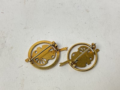 Lot 505 - Two First World War French yellow metal sweetheart brooches in the form of gun carriages, one marked Amiens 1914 - 1917 (2).