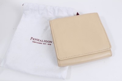 Lot 805 - Penhaligon's pink leather travel vanity case and cream leather travel jewellery wallet, both in dust bags, in one box