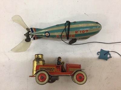 Lot 1943 - Box of children's toys including tin plate Marx airship, looping motor car, various building blocks and sets.