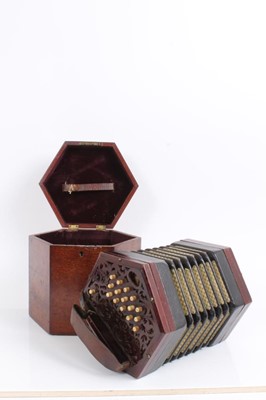 Lot 2200 - A good quality 30 key rosewood concertina with fretwork ends and bone keys, probably Lachenal, in original case