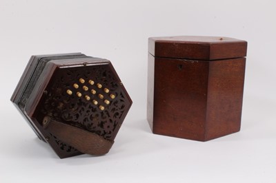 Lot 2200 - A good quality 30 key rosewood concertina with fretwork ends and bone keys, probably Lachenal, in original case