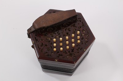 Lot 2200 - A good quality 30 key rosewood concertina with fretwork ends and bone keys, probably Lachenal, in original case