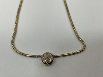 Lot 498 - Diamond single stone pendant with an old cut cushion shape diamond in 18ct gold setting on 18ct gold snake link chain.
