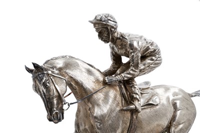 Lot 901 - A fine and impressive silver sculpture, 'The Final Frame', Lester Piggott on horseback, raised upon an oval green variegated marble base and oval wooden plinth, hallmarked London 1986