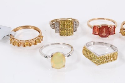 Lot 809 - Eight 9ct white and yellow gold gem set dress rings