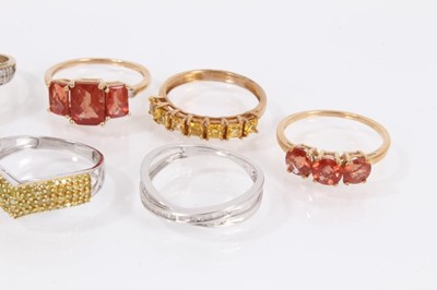Lot 809 - Eight 9ct white and yellow gold gem set dress rings