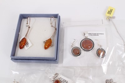 Lot 815 - Group of silver and white metal mounted amber jewellery