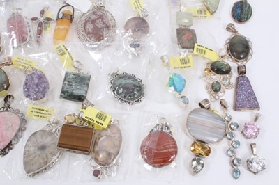 Lot 816 - Collection of silver mounted semi precious stone pendants