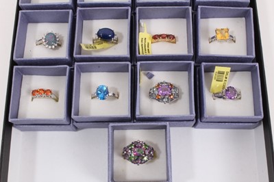 Lot 823 - Collection of 17 'Karis' gem set dress rings, boxed as new