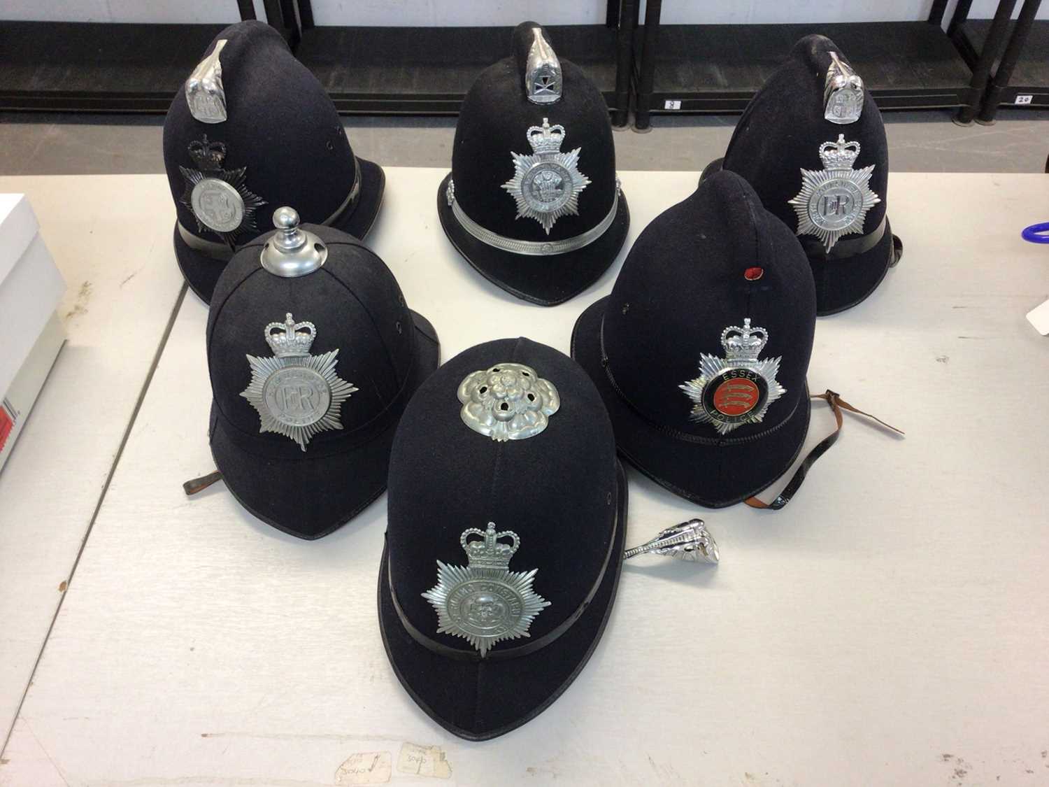 Lot 554 - Group of six Elizabeth II Police helmets for West Riding Constabulary, South Wales Constabulary, North Yorkshire Police, Durham Constabulary, Humberside Police and Essex Police (1 box)