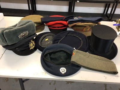 Lot 556 - One box of military caps and hats to include side caps, RAF caps and others (1 box)