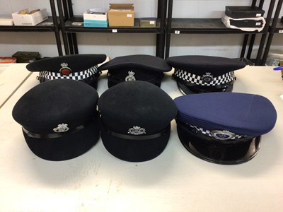 Lot 557 - Group of six Elizabeth II Police helmets for Essex Constabulary, Royal Hong Kong Police and others (1 box)