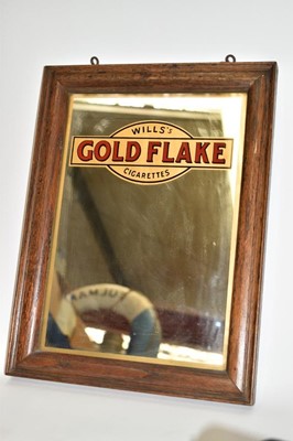 Lot 2412 - A 'Wills's Gold Flake Cigarettes' advertising mirror in oak frame, 41cm x 31cm