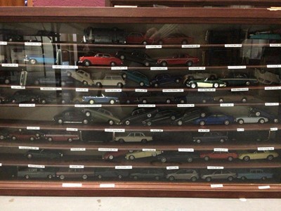 Lot 1806 - Two glazed front display cabinets with selection of model cars plus various Vanguard empty boxes (qty)