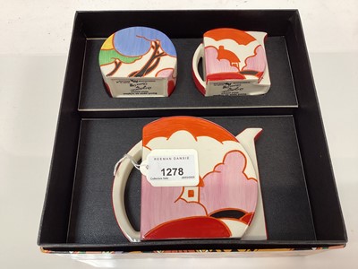 Lot 1278 - Wedgwood Clarice Cliff limited edition Stamford tea set for two decorated in the blue autumn pattern No. 56 of 250, boxed with certificate and two trio stands
