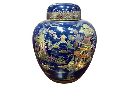 Lot 1119 - Large Carlton Ware ginger jar and cover, 31cm high, printed and enamelled in colours and gilt mottled blue ground