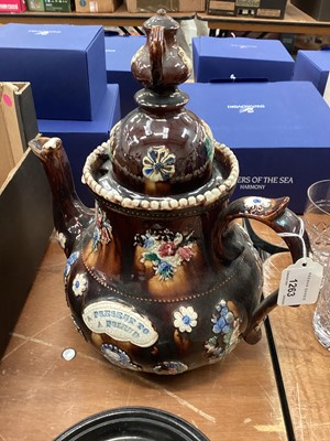 Lot 1263 - A large bargeware teapot and four Victorian pot lids