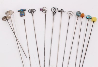 Lot 886 - Collection of twelve vintage hat pins including five silver pins by Charles Horner, three enamelled pins and four set with gem stones/ beads