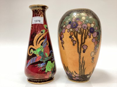 Lot 1270 - A Fieldings Crown Devon lustrine vase painted in colours and gilt with an exotic bird amongst stylised flowers and another Crown Devon vase pattern no. 2674