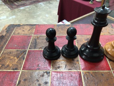Lot 2494 - Antique Jaques & Son wooden complete chess set. King measuring 8.5cm high, white king stamped 'Jaques London', within a leather covered folding chess board