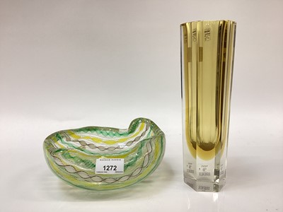 Lot 1272 - A Murano glass leaf shaped dish with pinched top rim alterate yellow, green, white canes cased in clear glass.  Together with a slim six sided panel glass with Murano labels
