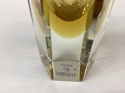 Lot 1272 - A Murano glass leaf shaped dish with pinched top rim alterate yellow, green, white canes cased in clear glass.  Together with a slim six sided panel glass with Murano labels