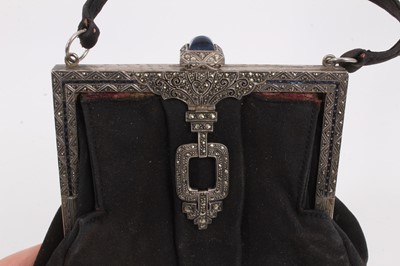 Lot 2108 - Two vintage evening hand bags , one Art Deco silver marked 935 with steel pin and blue stone decoration and blue cabachon clasp
