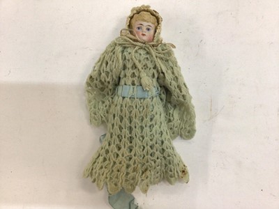 Lot 1976 - Victorian China head and shoulder doll marked 1222  3/0, with moulded blonde curly hair, painted features,china lower arms and leg ( one lower leg missing), fabric waisted body.