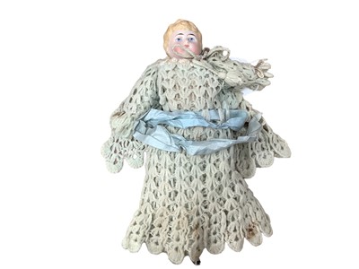 Lot 753 - Victorian China head and shoulder doll marked 1222  3/0, with moulded blonde curly hair, painted features,china lower arms and leg ( one lower leg missing), fabric waisted body.