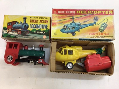 Lot 1960 - Marx battery operated remote control helicopter, Marx tricky action locomotive battery operated, Scalex boats drifter No 424S, Friction driven light tank, lucky toys friction driven fire chief car,...