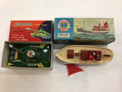 Lot 1960 - Marx battery operated remote control helicopter, Marx tricky action locomotive battery operated, Scalex boats drifter No 424S, Friction driven light tank, lucky toys friction driven fire chief car,...