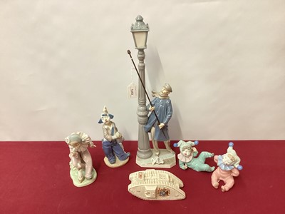 Lot 1282 - Small group of Nao and Lladro figures and a Carlton China tank ornament