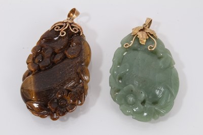 Lot 496 - Two Chinese hard stone pendants