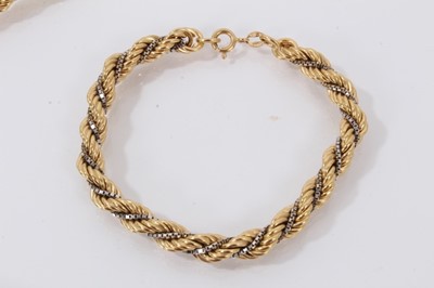 Lot 536 - 18ct white and yellow gold rope twist necklace and matching bracelet, marked 750.