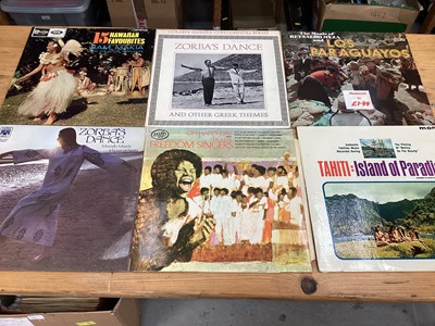 Lot 2240 - LP's one box comedy albums and one case of world music (2)