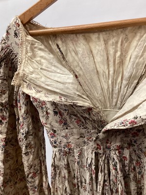 Lot 2110 - 1837 Victorian maternity day dress in Indian printed cotton, bodice has feeding openings with tiny button fastenings, large gigot sleeves, gathered bodice front and back and high waistline.