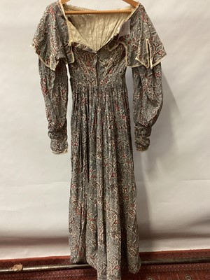 Lot 2111 - 1834/1835 Georgian maternity day dress in Indian printed cotton with tiny crochet edging, bodice has feeding openings which have been closed with small stitches. Large gigot sleeves narrowing to...
