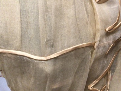 Lot 2112 - 1832 pair Georgian silk gauze dresses with satin trims, intended to be worn over an outer dress, worn as bridemaid dresses. High waisted , one with original ribbon belt and buckle, gigot sleeves (...