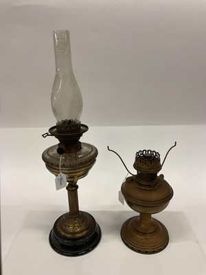 Lot 2600 - Early 20th century brass and ceramic oil lamp, together with another similar (2).