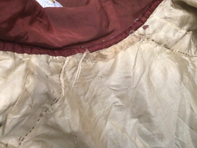 Lot 2114 - 1832 Georgian Carriage dress maroon silk with double cape collar trimmed with braid, padded and gathered skirt.