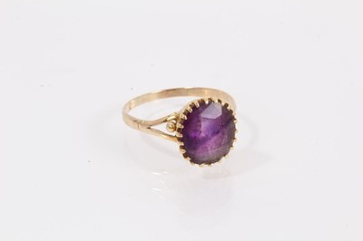 Lot 865 - 9ct gold amethyst ring and a yellow metal guard chain
