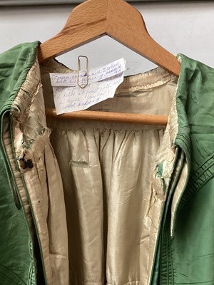 Lot 2116 - 1835 Georgian green silk cloak with double collar and lined with cream silk, padded hemline .