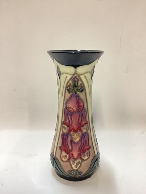 Lot 1248 - Moorcroft pottery vase decorated in the Foxglove pattern, signed and dated 93, 20.5cm high