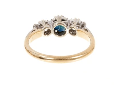 Lot 432 - Sapphire and diamond three stone ring in platinum setting on 18ct yellow gold shank