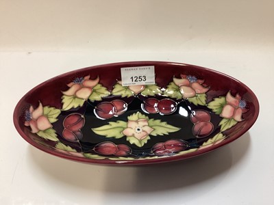 Lot 1253 - Moorcroft pottery oval dish decorated in the Morello Cherry pattern, dated 95, 23cm