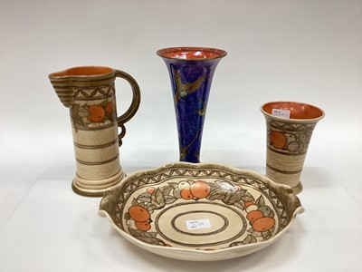 Lot 1260 - Three pieces of Ducal art pottery and blue lustre vase decorated with birds