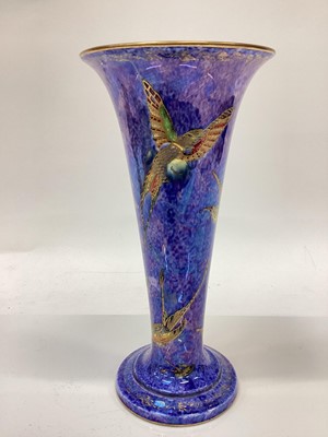 Lot 1260 - Three pieces of Ducal art pottery and blue lustre vase decorated with birds