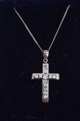 Lot 874 - 9ct white gold and synthetic white stone cross pendant on 9ct white gold chain
